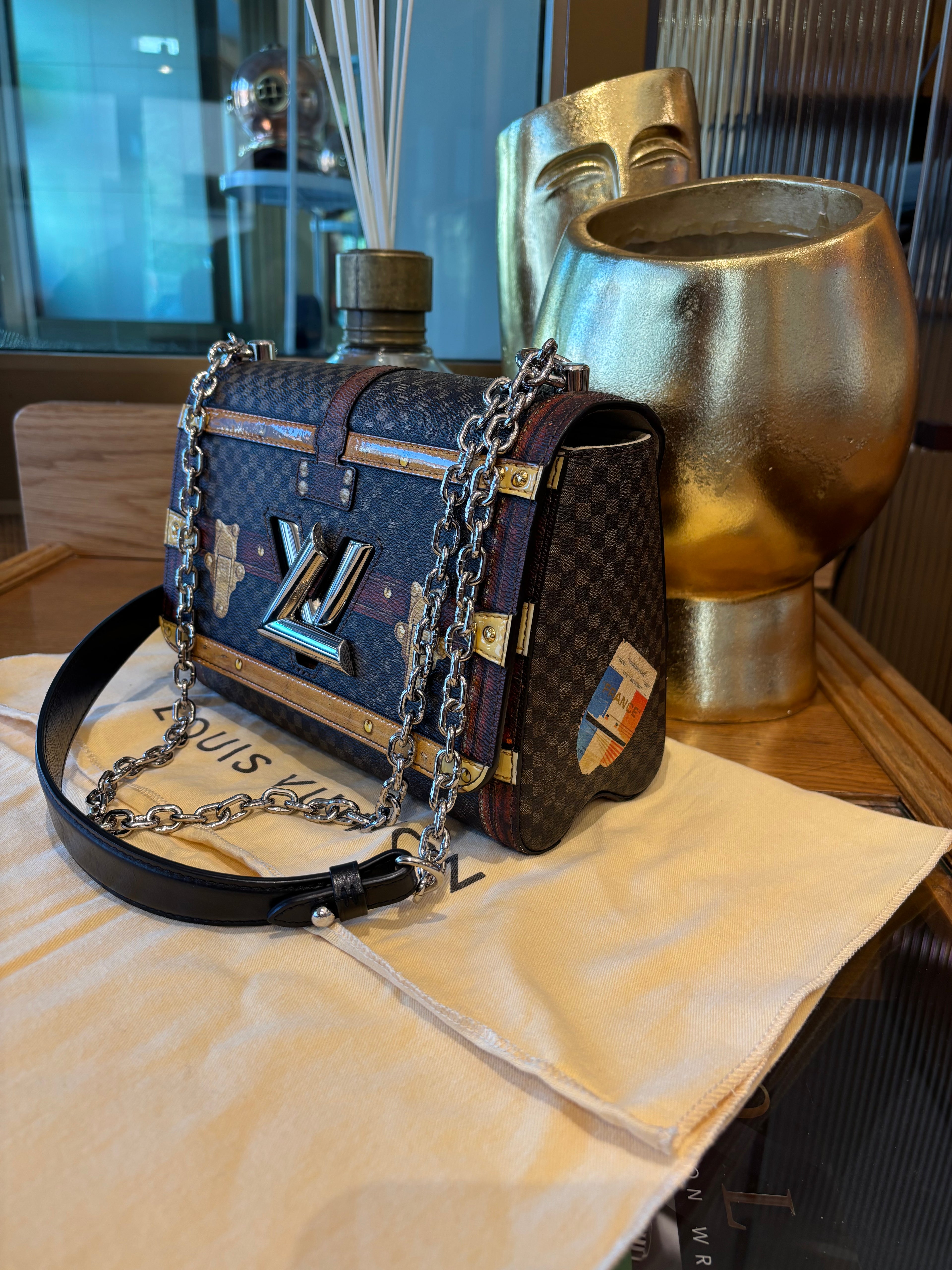 Louis Vuitton Damier Time Trunk Twist.