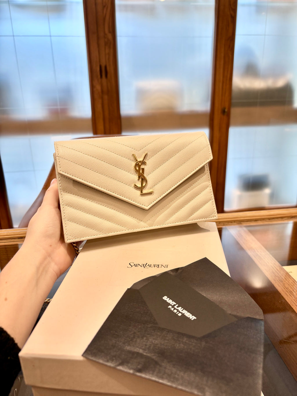 YSL Cassandre bianca minuteria oro