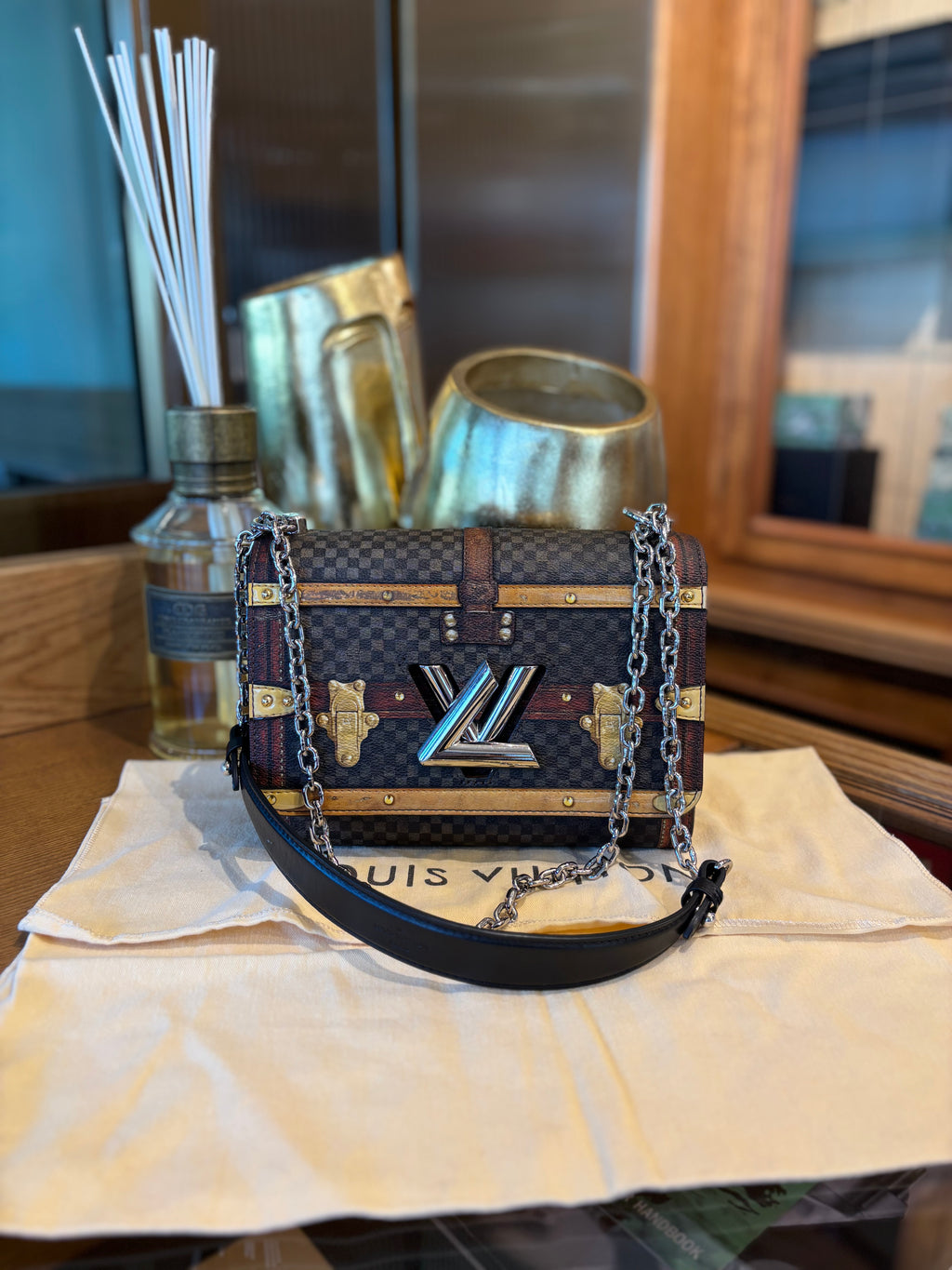 Louis Vuitton Damier Time Trunk Twist.