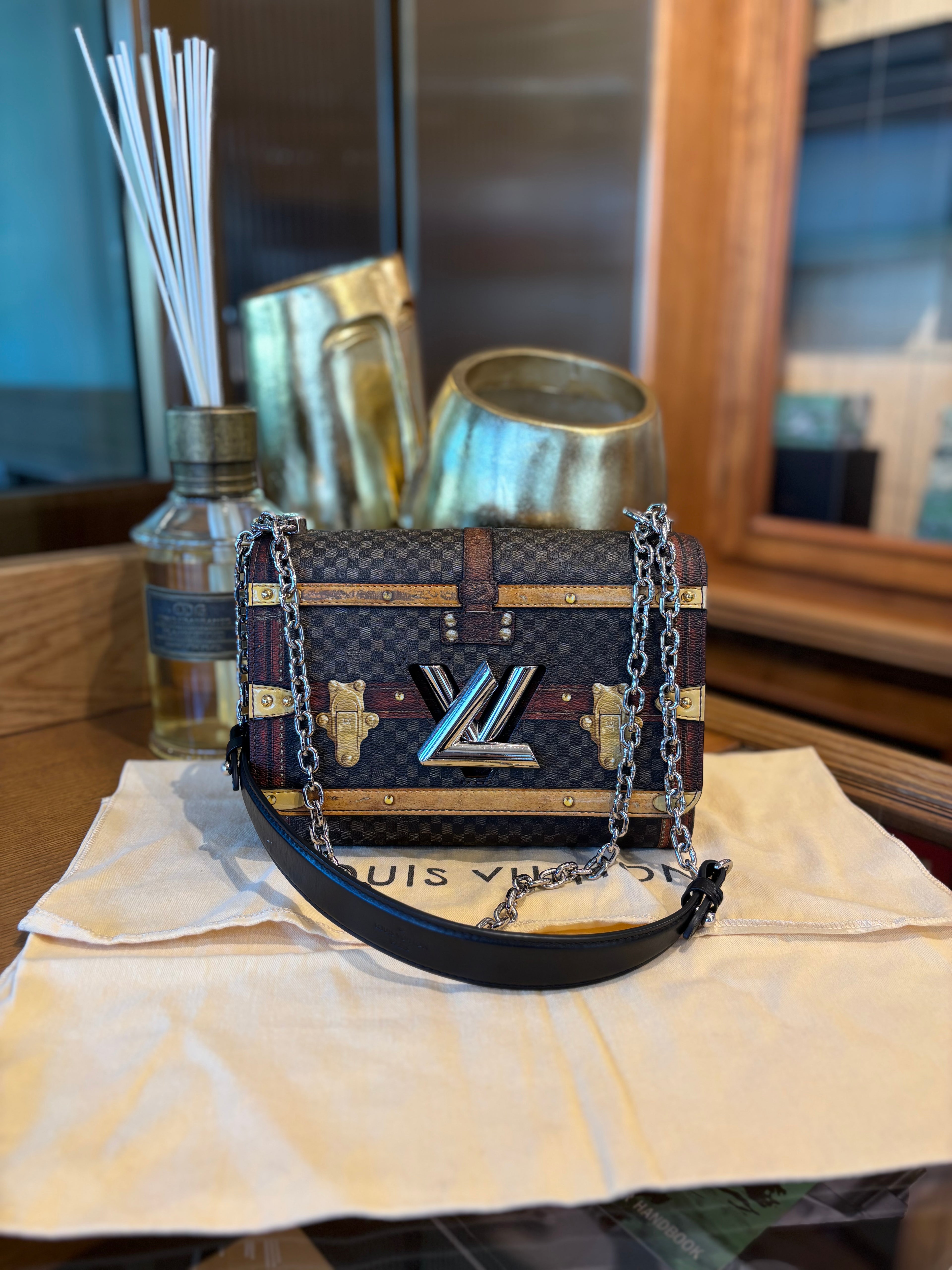 Louis Vuitton Damier Time Trunk Twist.