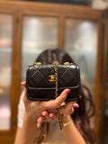 Chanel Mini Flap Bag con Ciondolo regolabile