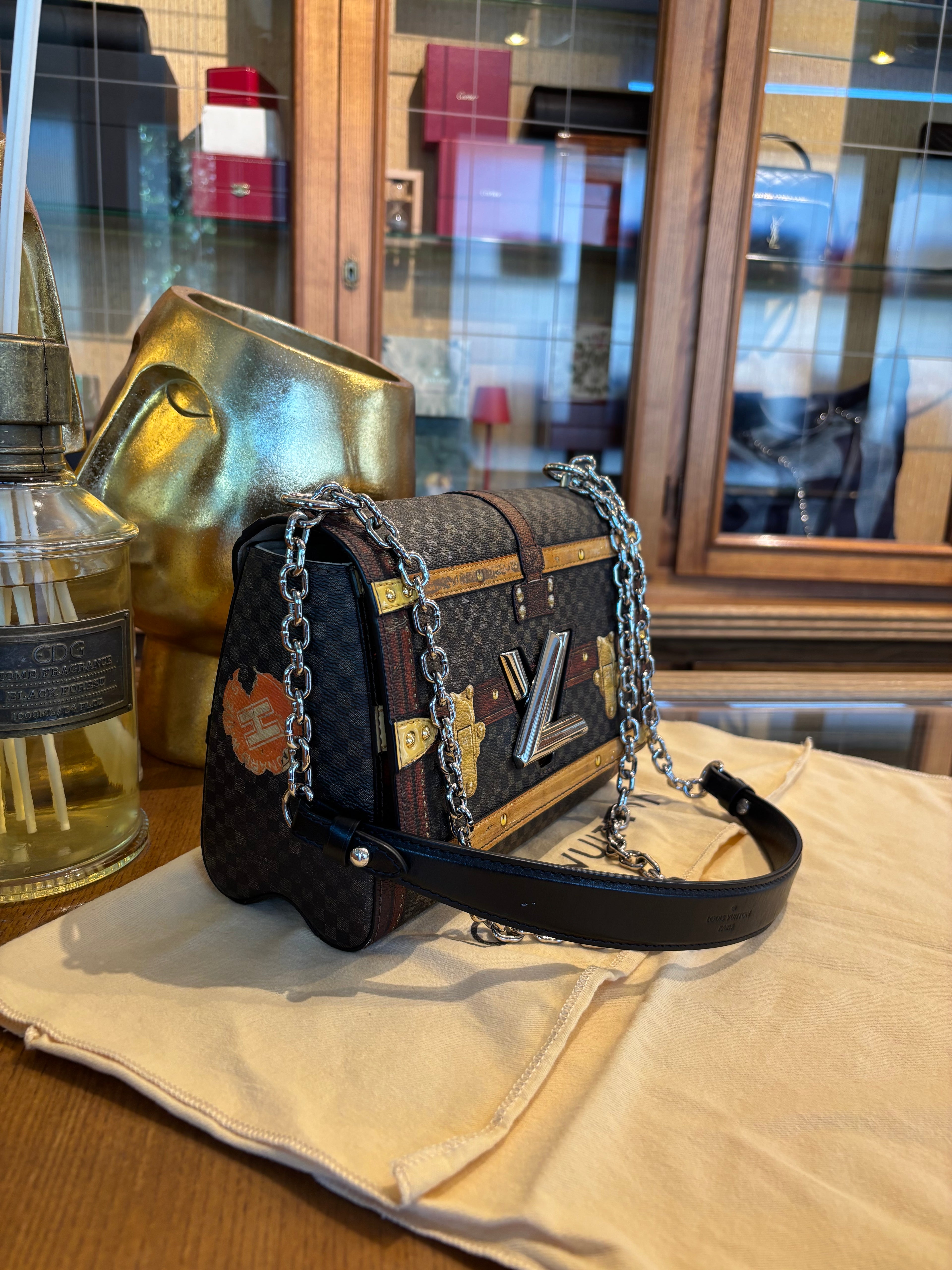 Louis Vuitton Damier Time Trunk Twist.