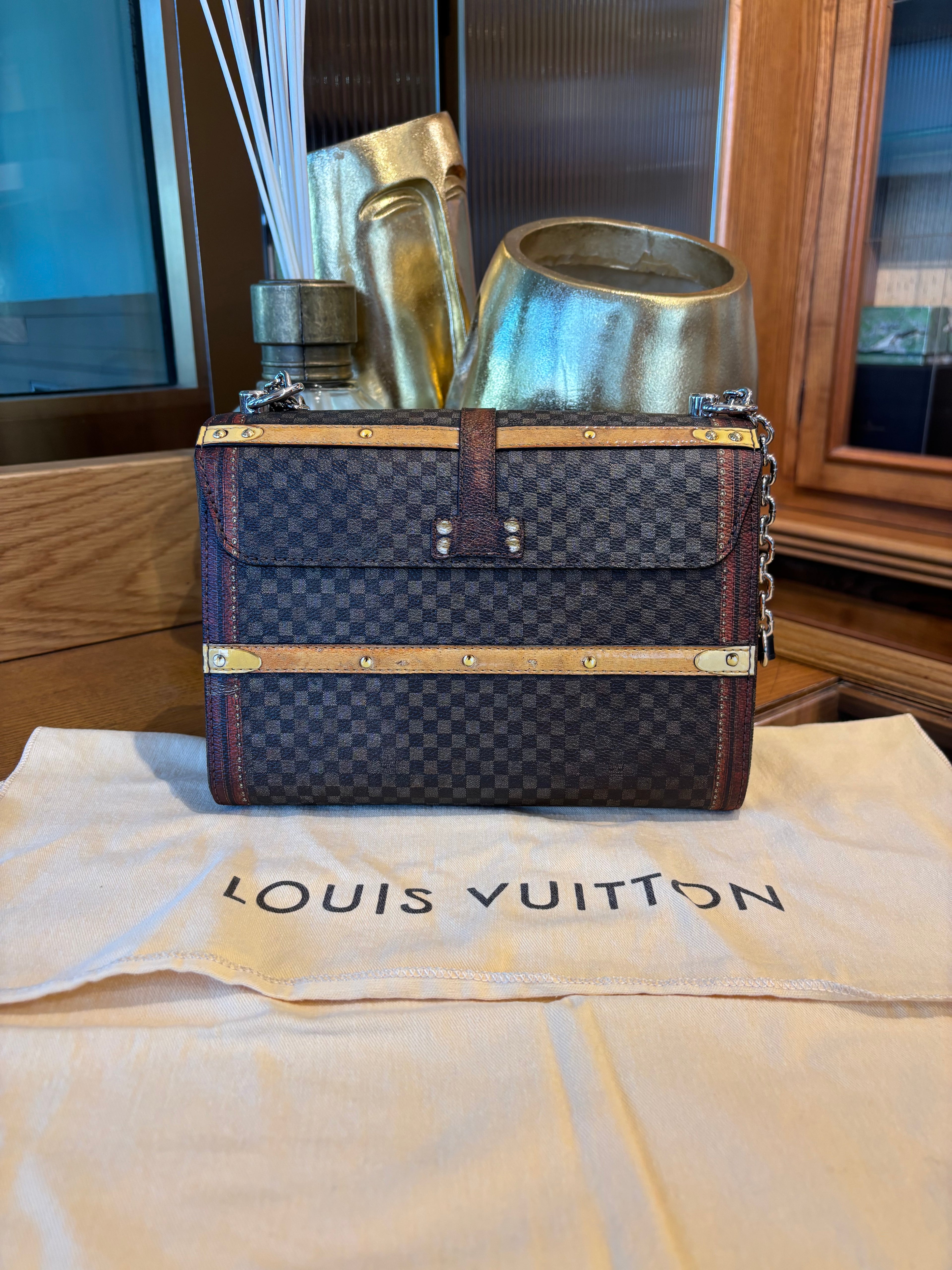 Louis Vuitton Damier Time Trunk Twist.