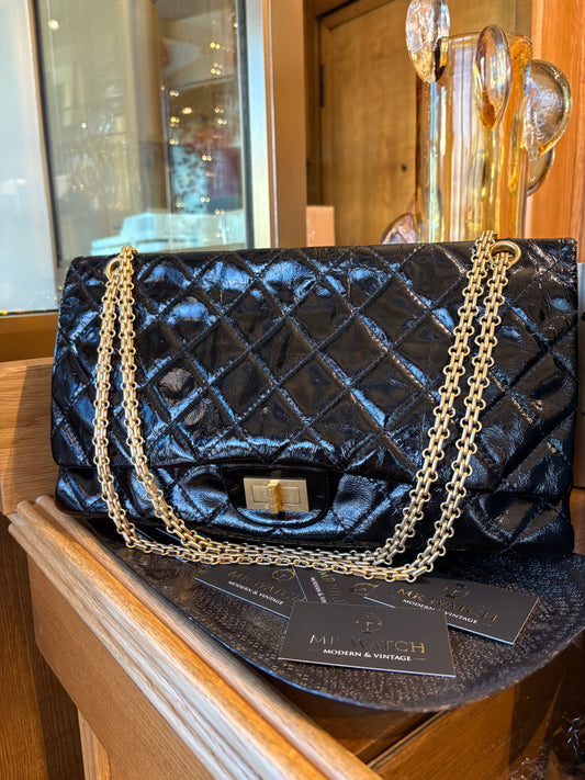 Chanel Maxy jumbo in vernice minuteria oro