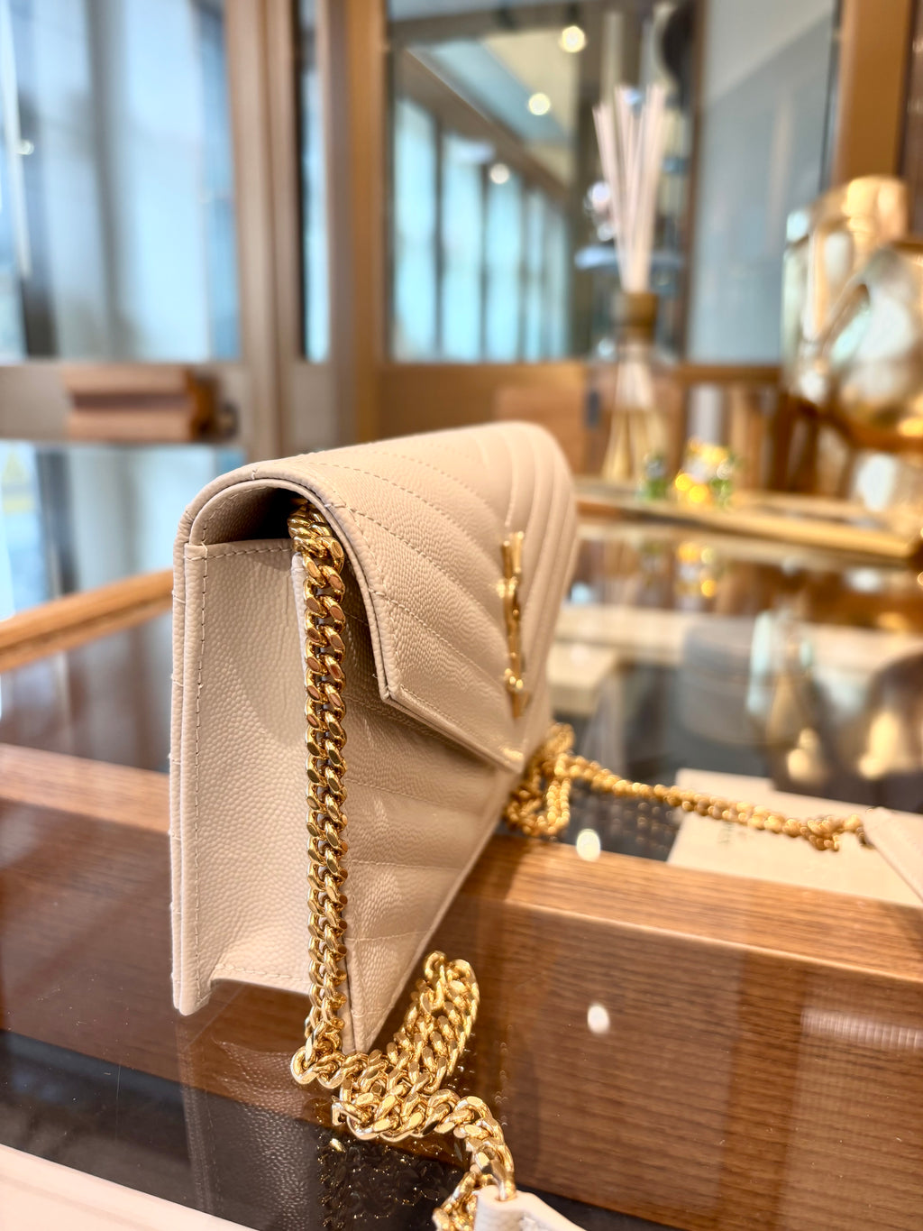 YSL Cassandre bianca minuteria oro